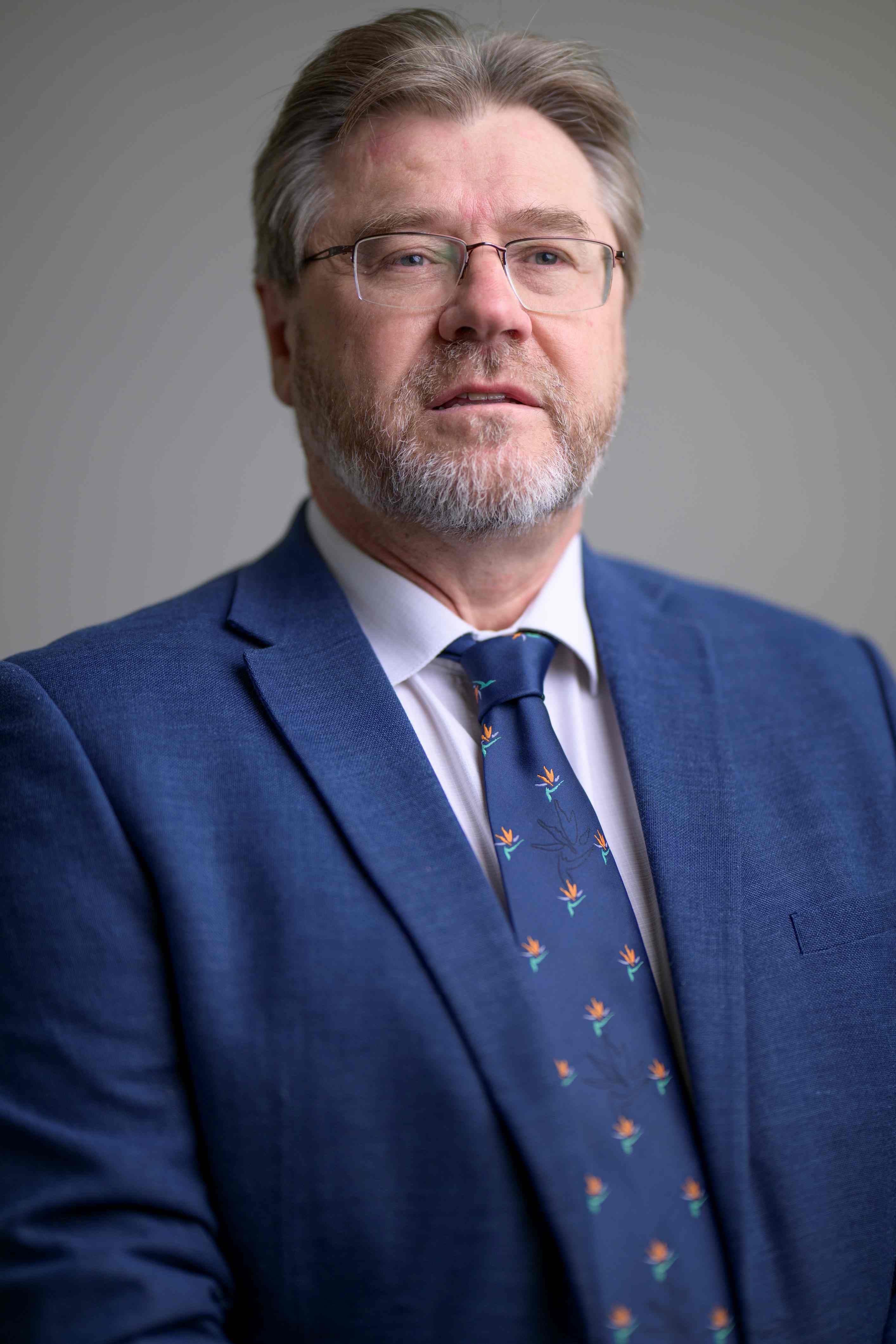 Portrait of Prof. Guy F Midgley 